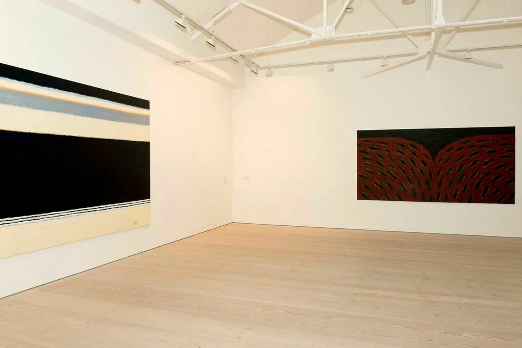 Visitors in Farhad Khalilov's exhibition at Saatchi Gallery, London, 2015.