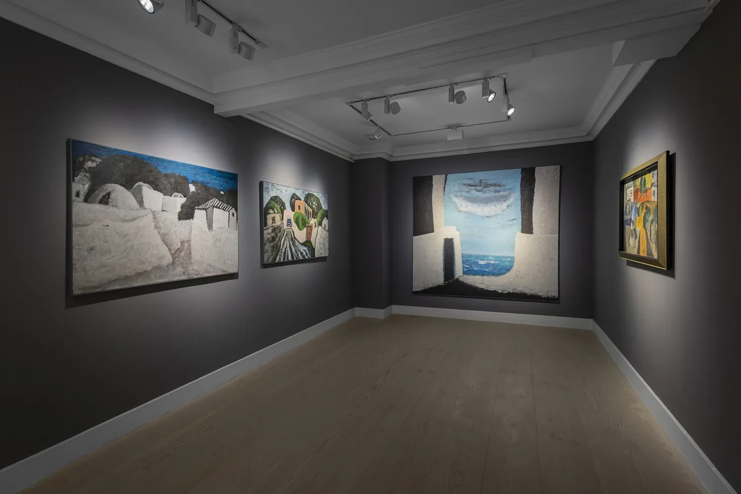 The dark-walled gallery of The New Verge, showing landscapes and abstract paintings arranged across three walls.