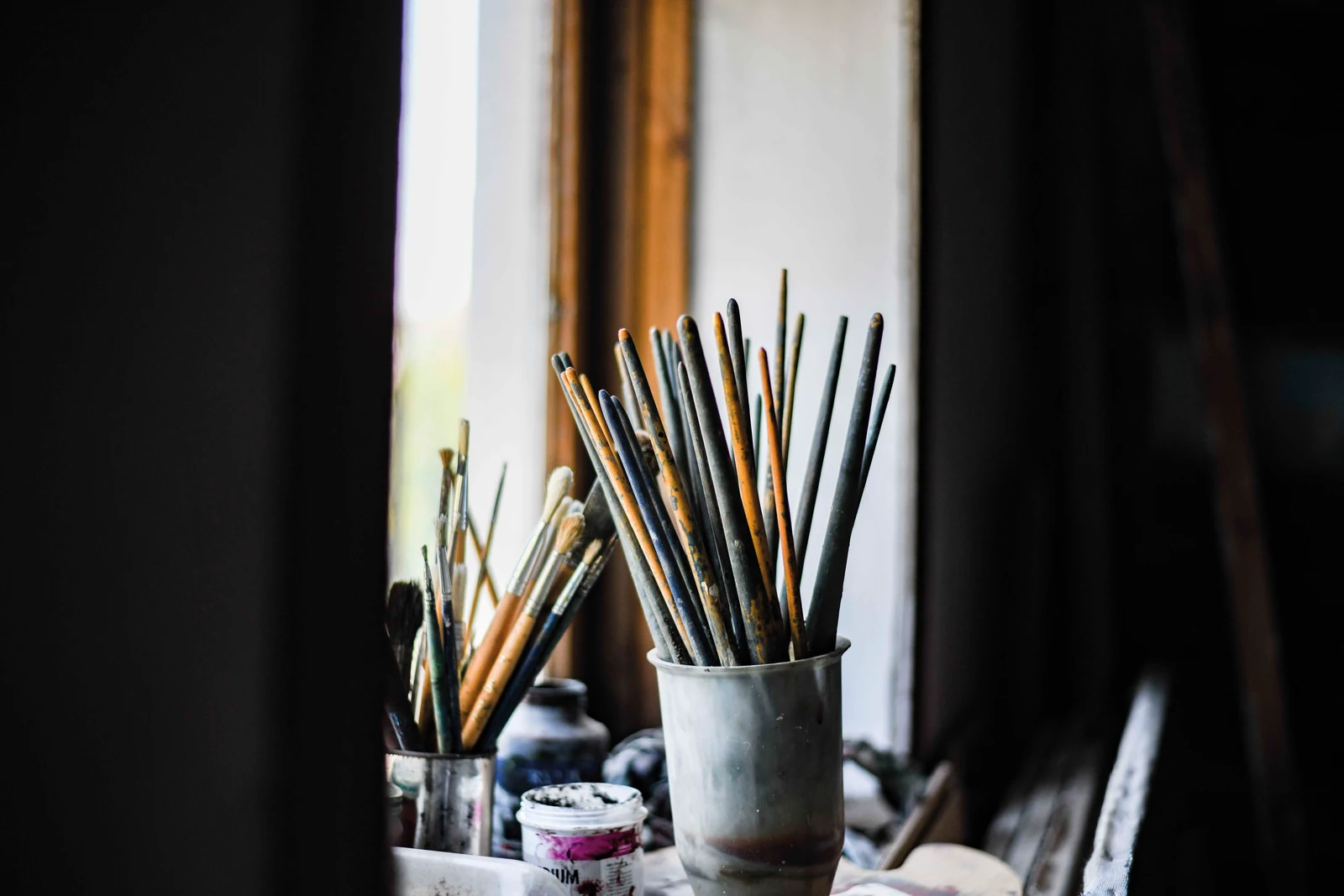 Brushes and painting materials in the studio. Photograph by Maya Baghirova.