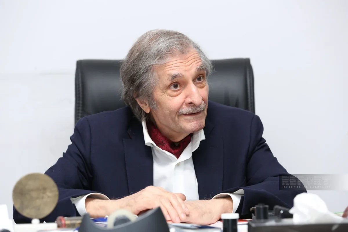 Farhad Khalilov smiling during the conversation with Report.az.